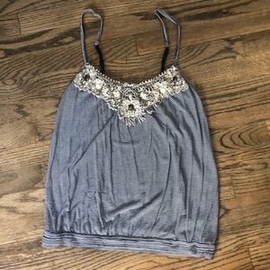 Striped tank with beautiful detailing!